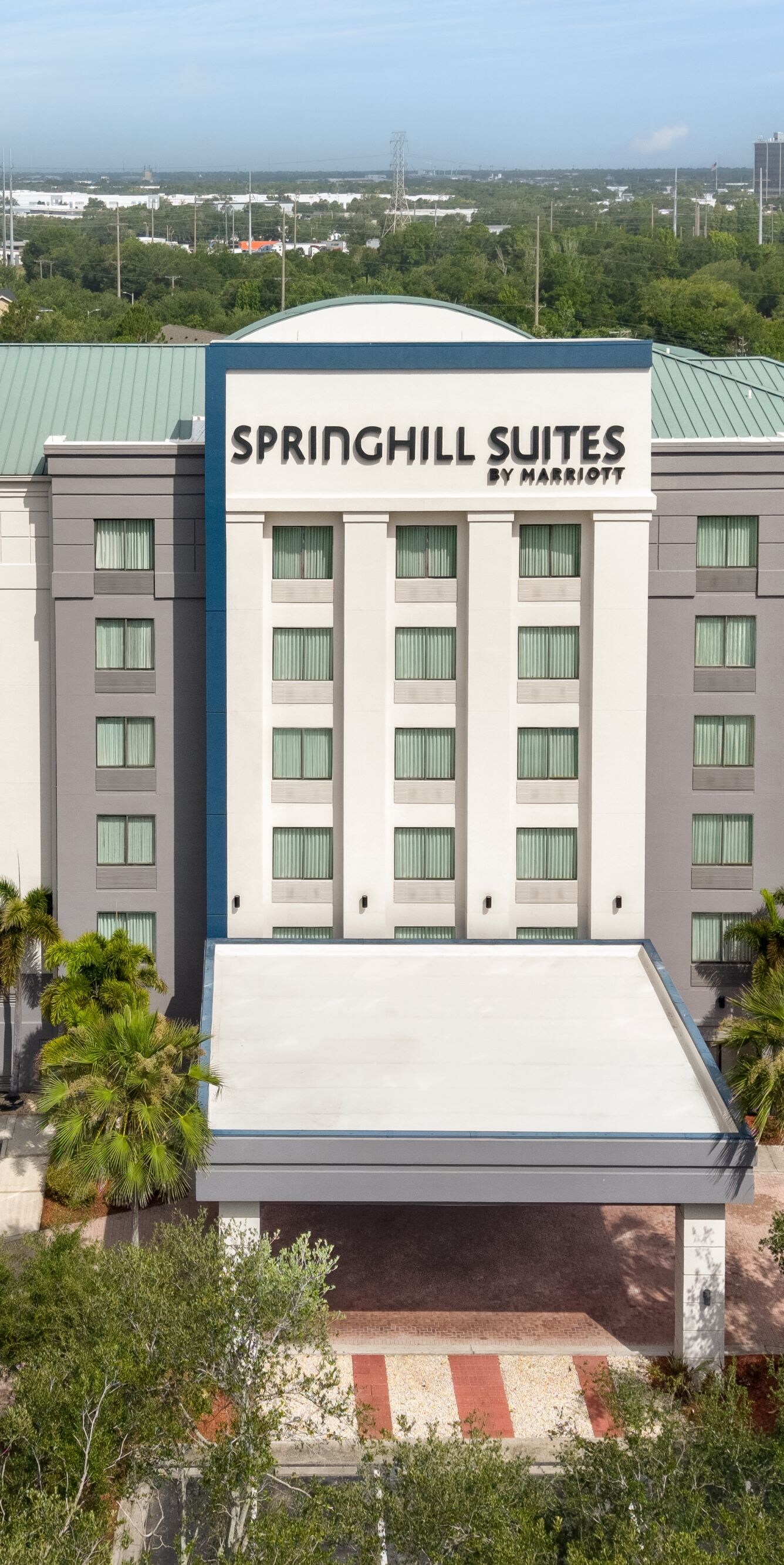 Drone shot of hotel exterior in daylight