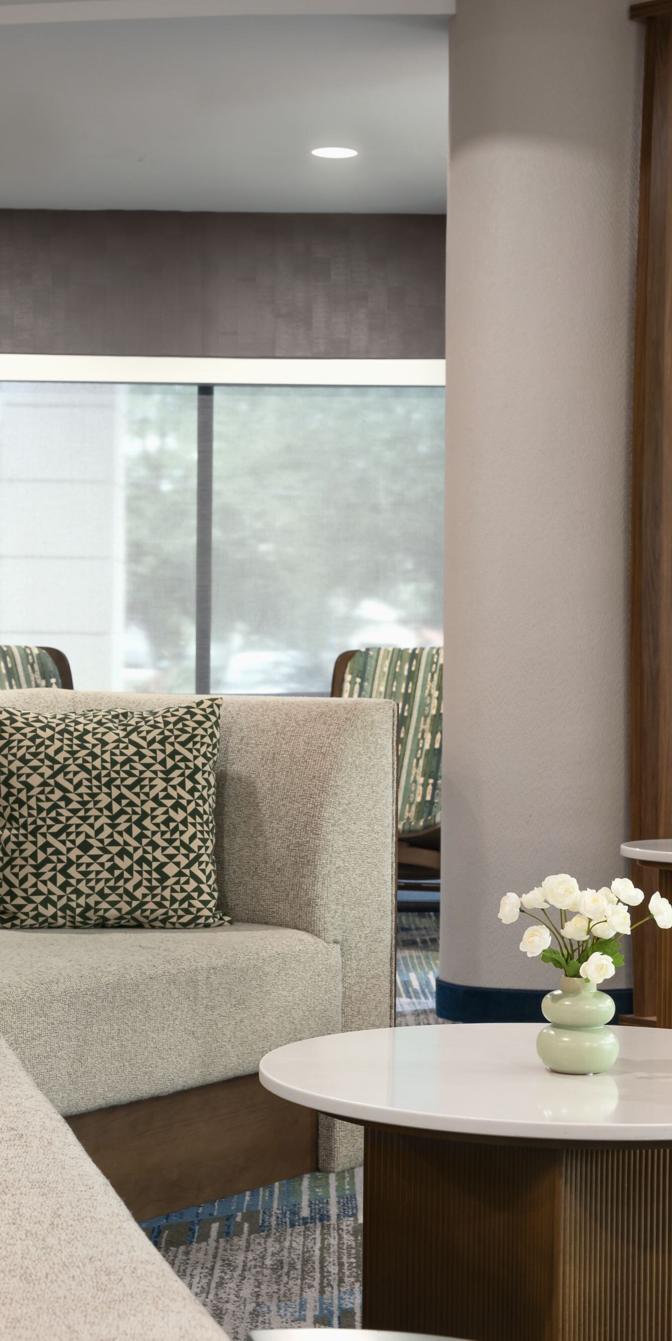 Comfortable lobby seating with plush sofa