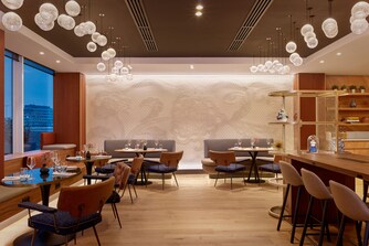 Commune Restaurant Interior with airport view