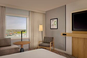 King Bed Room with Airport View