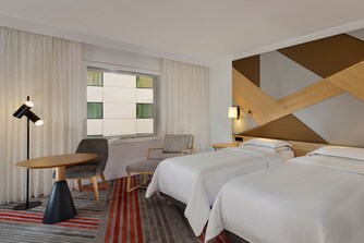 twin beds with atrium view