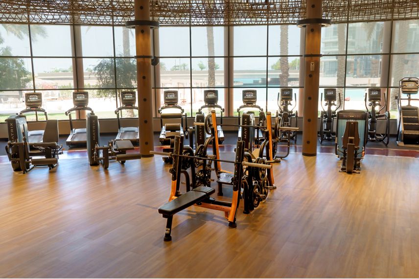 Well-equipped gym with cardio equipment