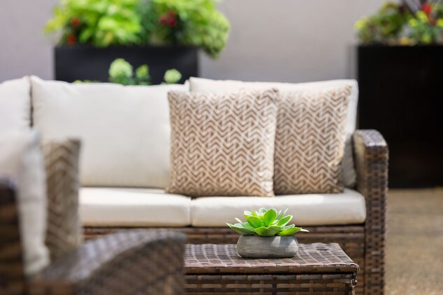 Patio furniture with succulent on table
