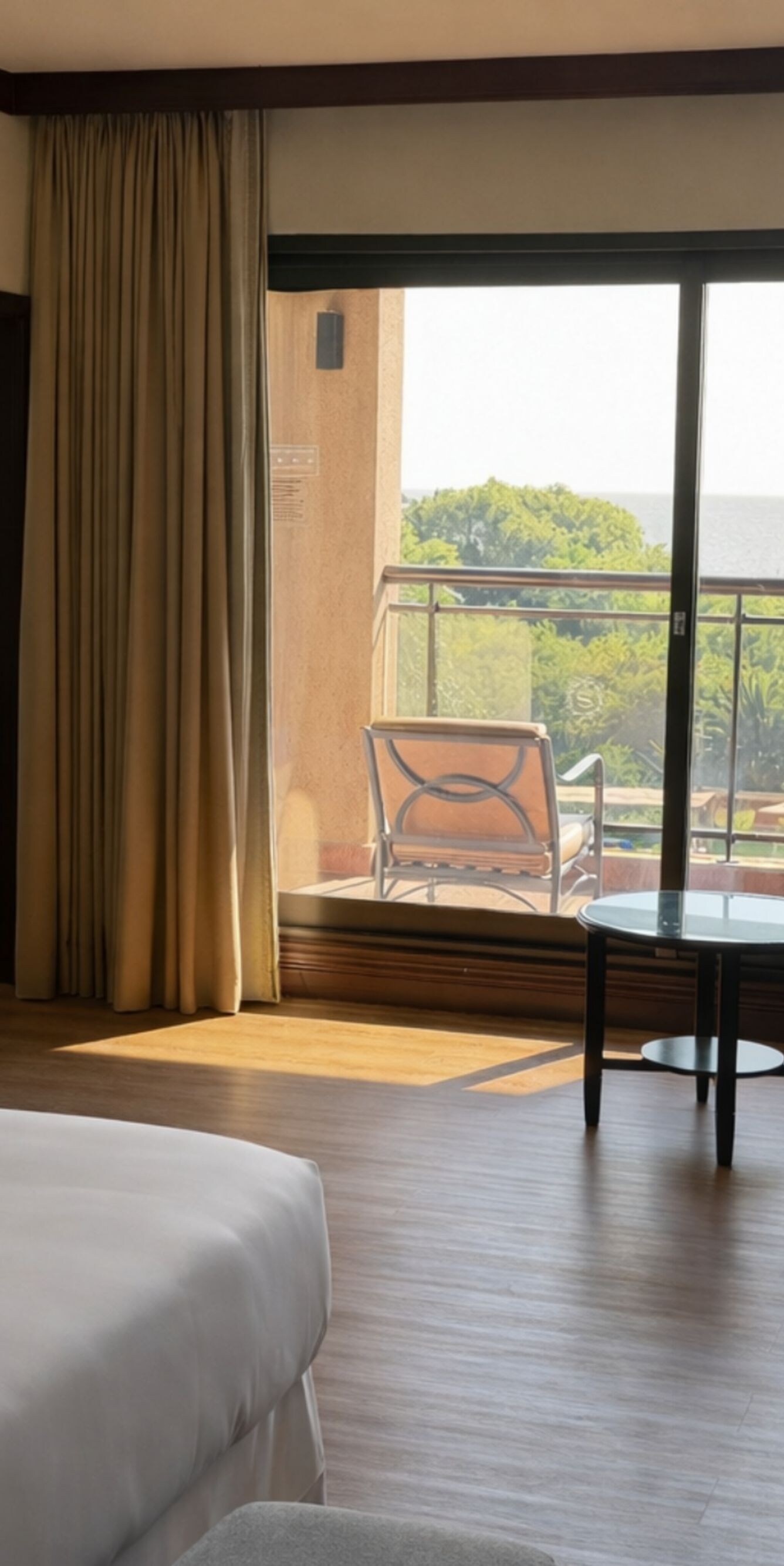 bed, couch, lamp, and balcony