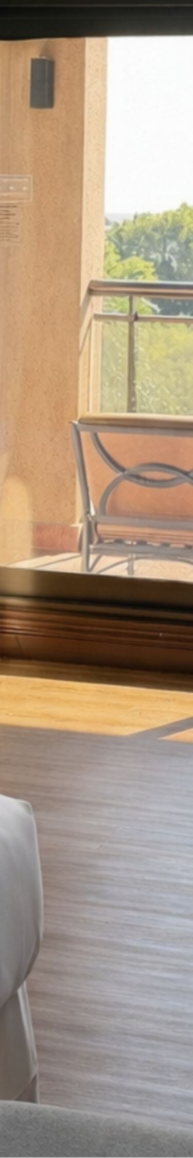 bed, couch, lamp, and balcony