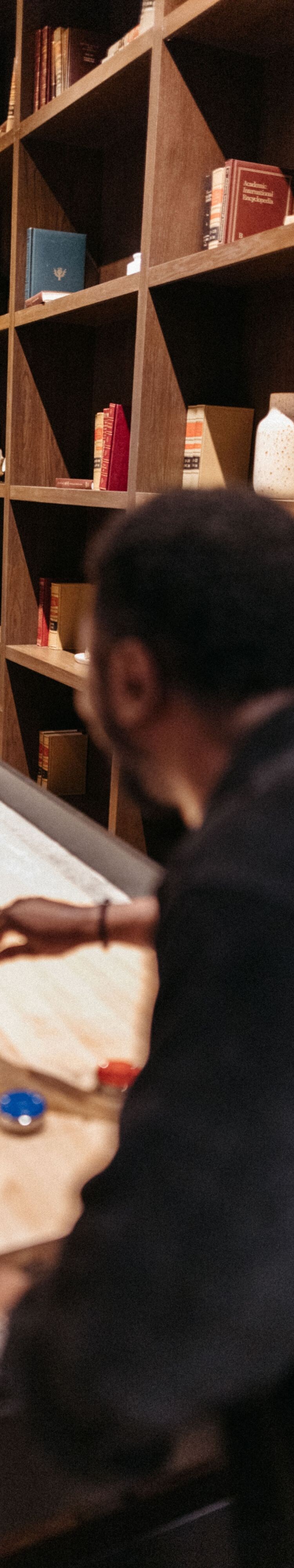 Two people playing shuffle board