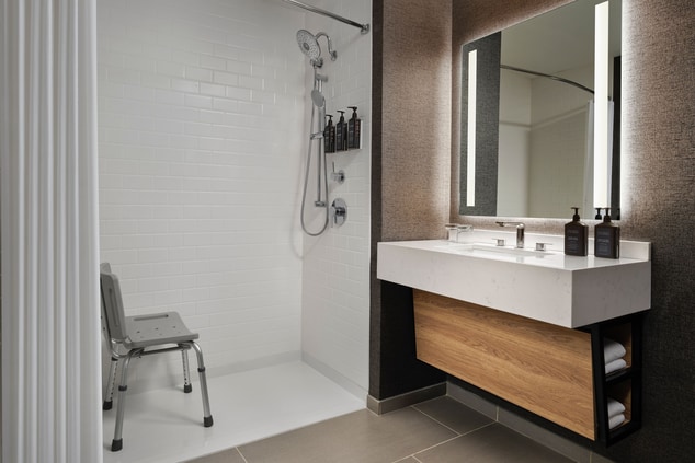 Stylish accessible Bathroom with Roll-in Shower
