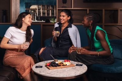 Three Friends enjoying cocktails