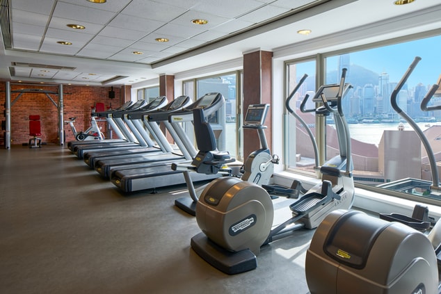 Health club with various fitness equipments.