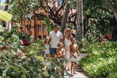 Family Walking To Helumoa Pool