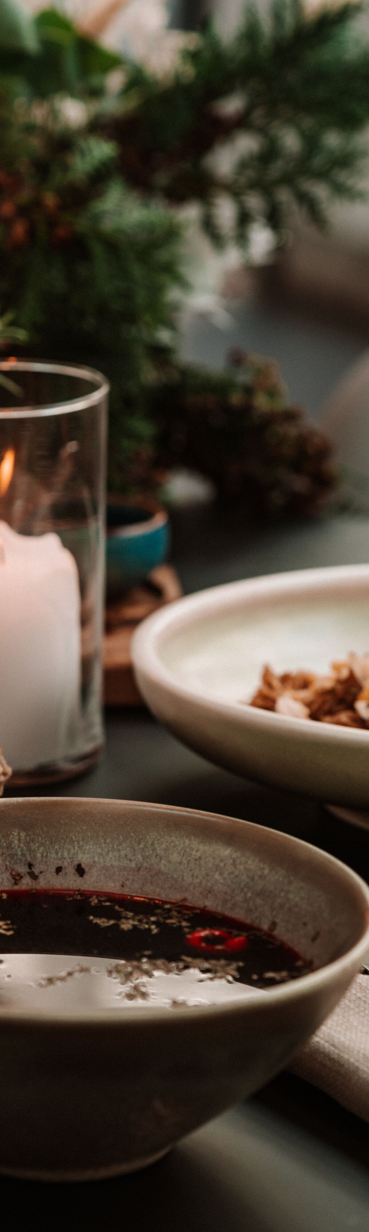 Borsch, fish, gingerbread house, candle