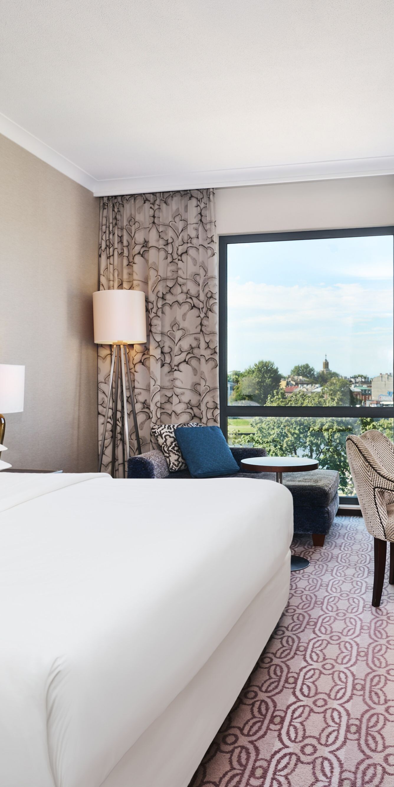 Grand Deluxe Room with king bed and river view