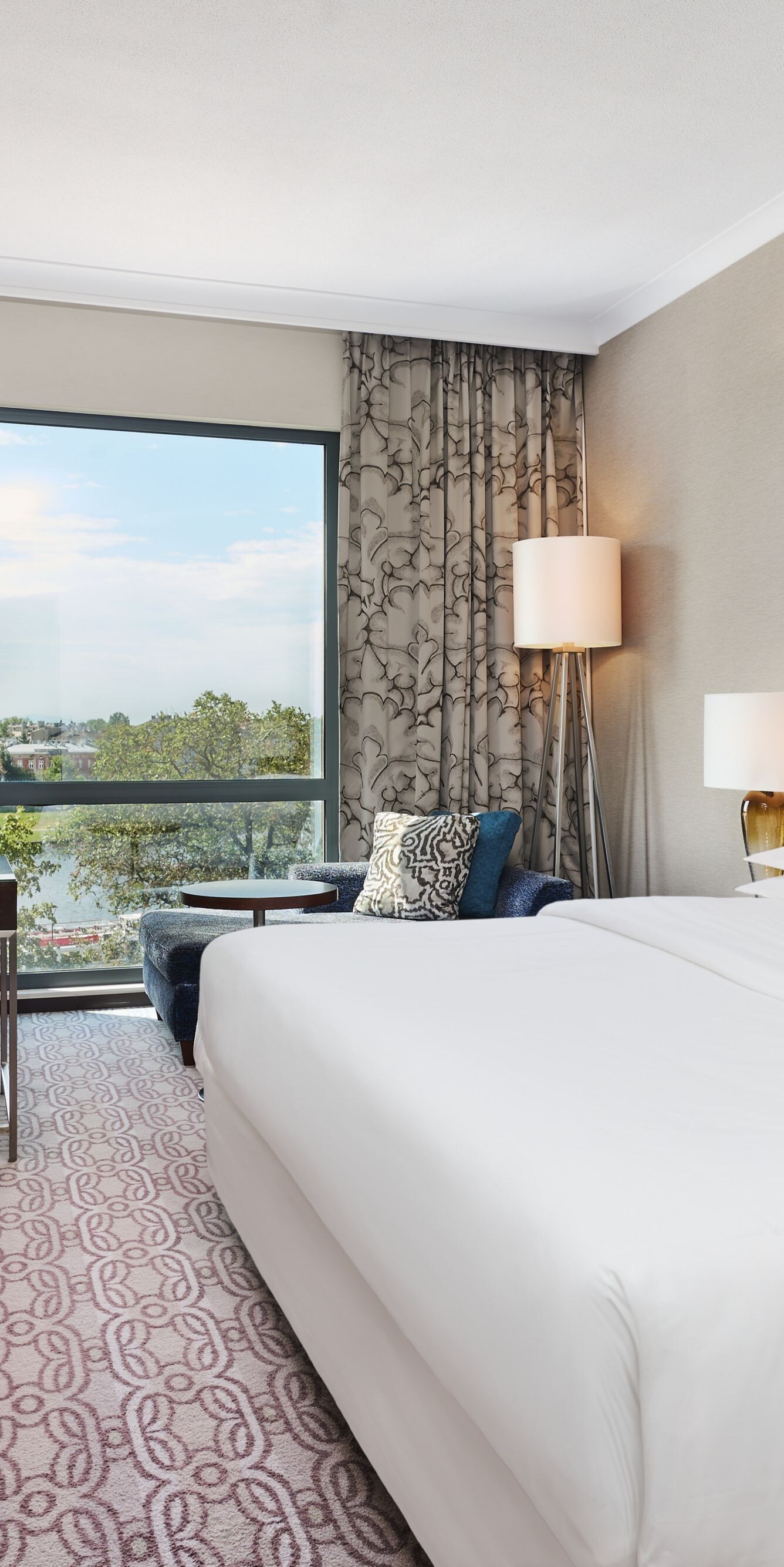 Premium Room with king bed and river view