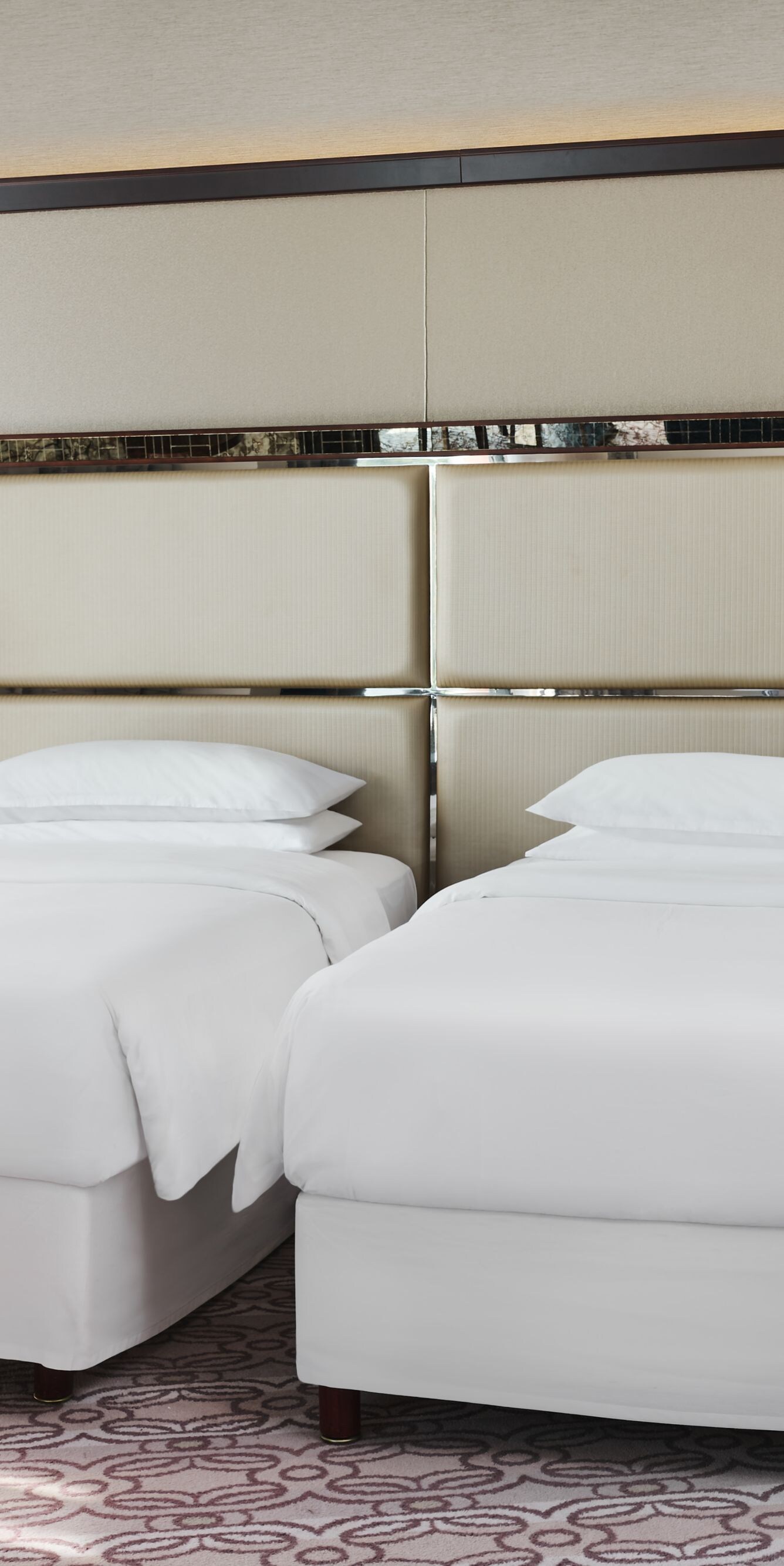 Two twin beds with bedside table