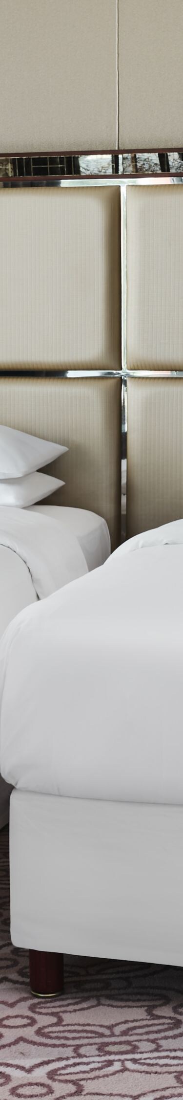 Two twin beds with bedside table