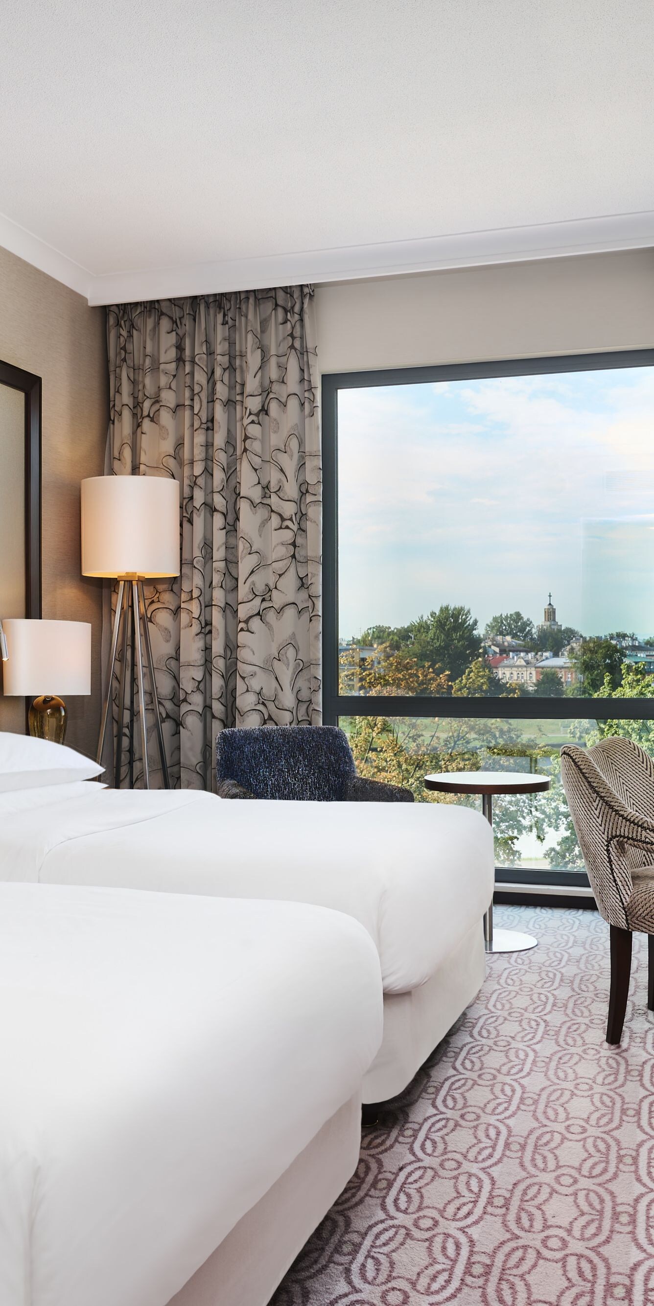 Grand Deluxe Room with twin beds and river view