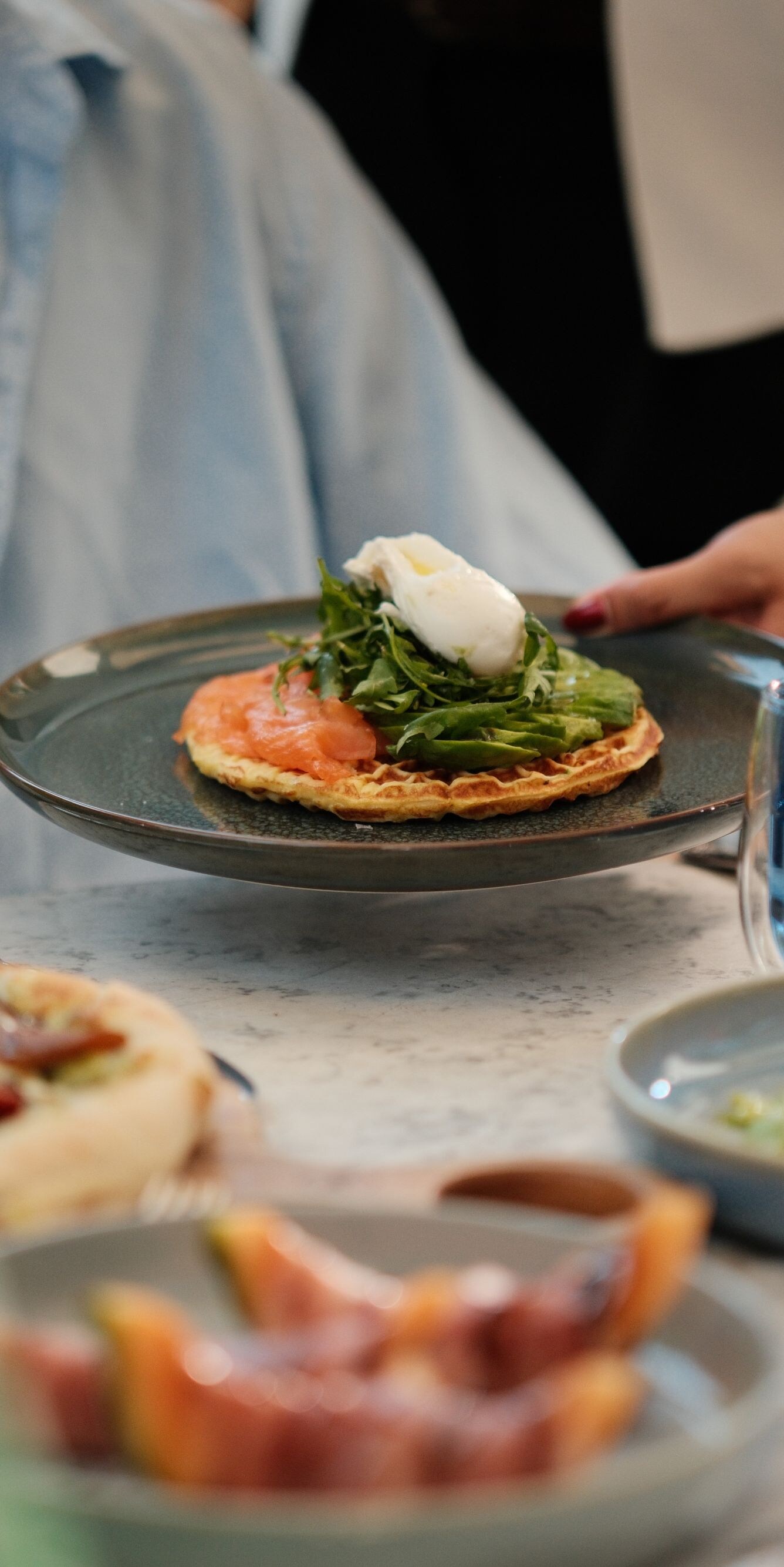 Potato waffle brunch dish placed on table