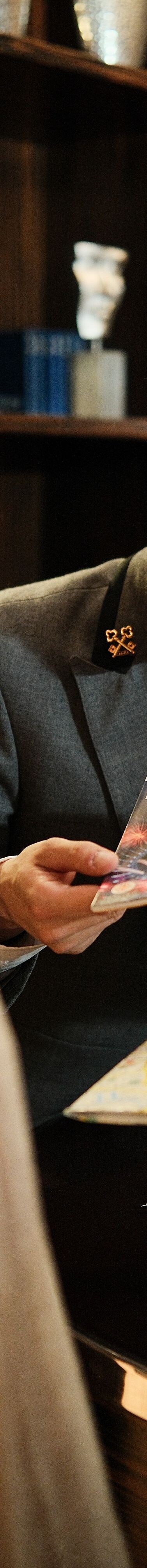Concierge handing brochure to guest