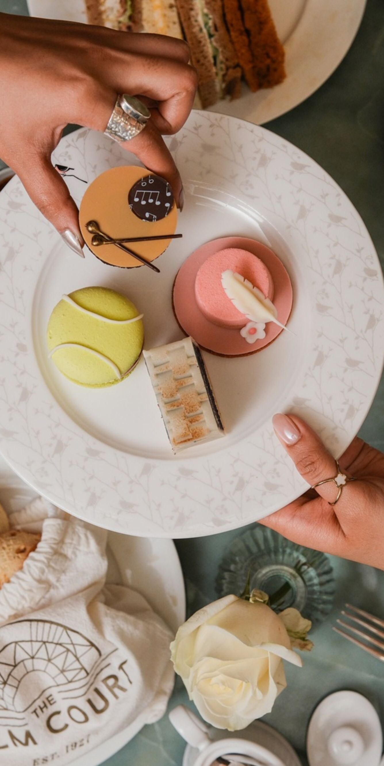 Afternoon tea pastries and scones on table
