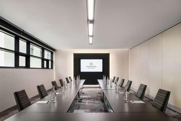 Boardroom set up with a capacity of 21 guests