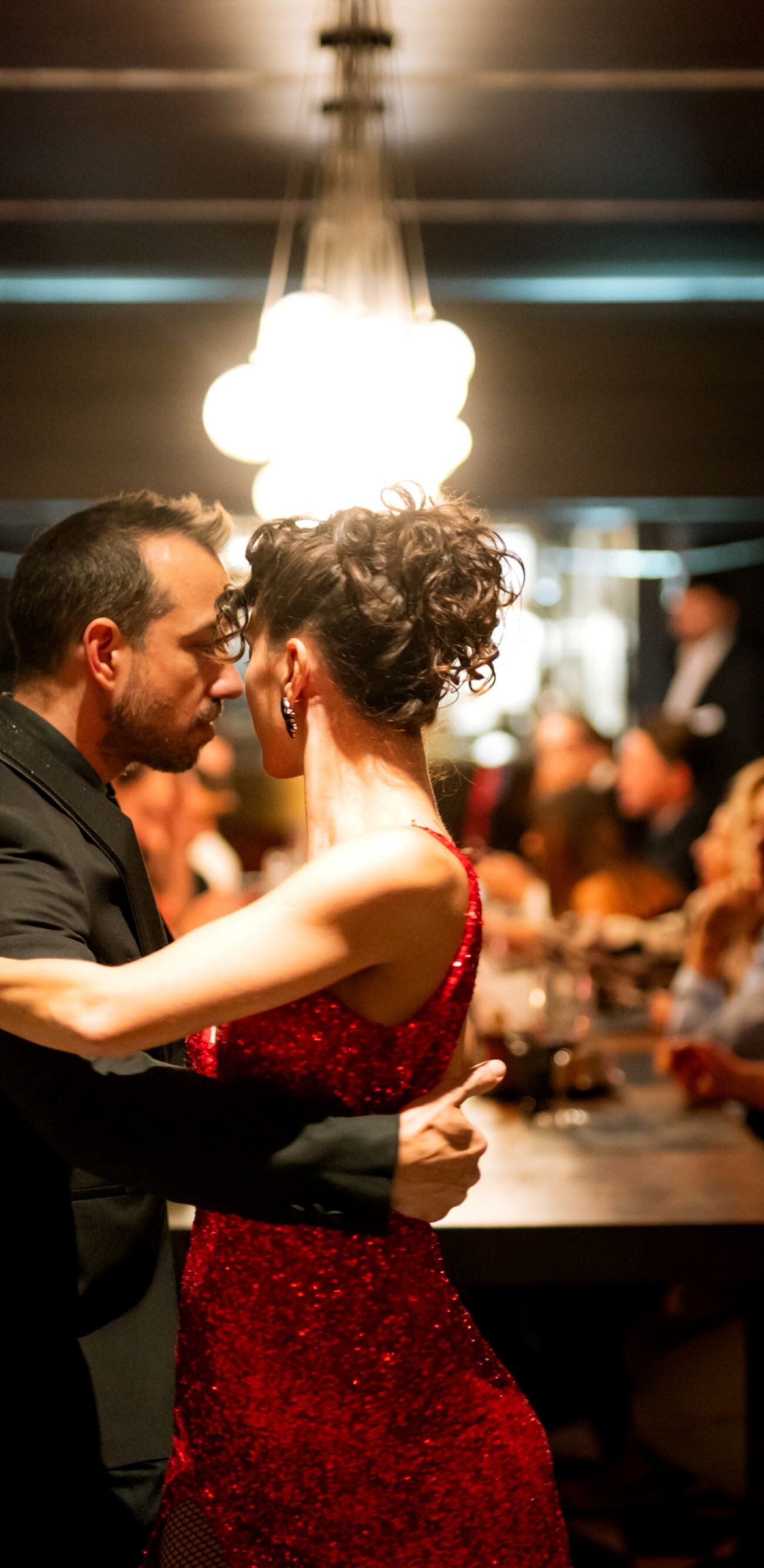 Couple dancing tango in elegant setting