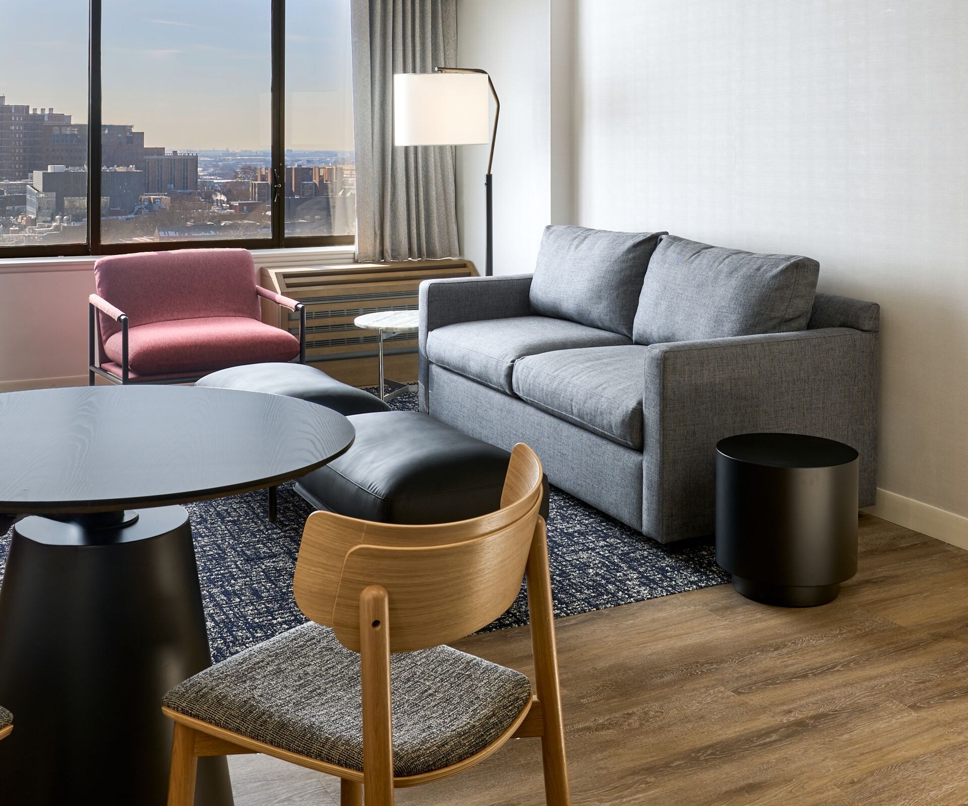 Living Room with sofa, chair, dining table, TV