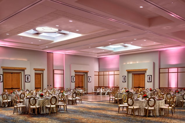 Komatke ballroom with tables set for social event