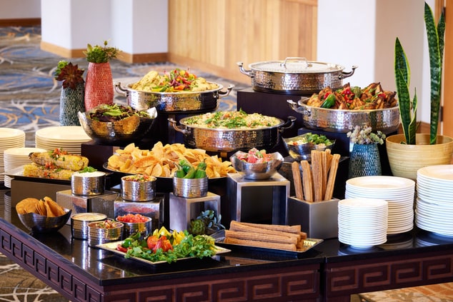 Buffet in meeting room with variety of foods