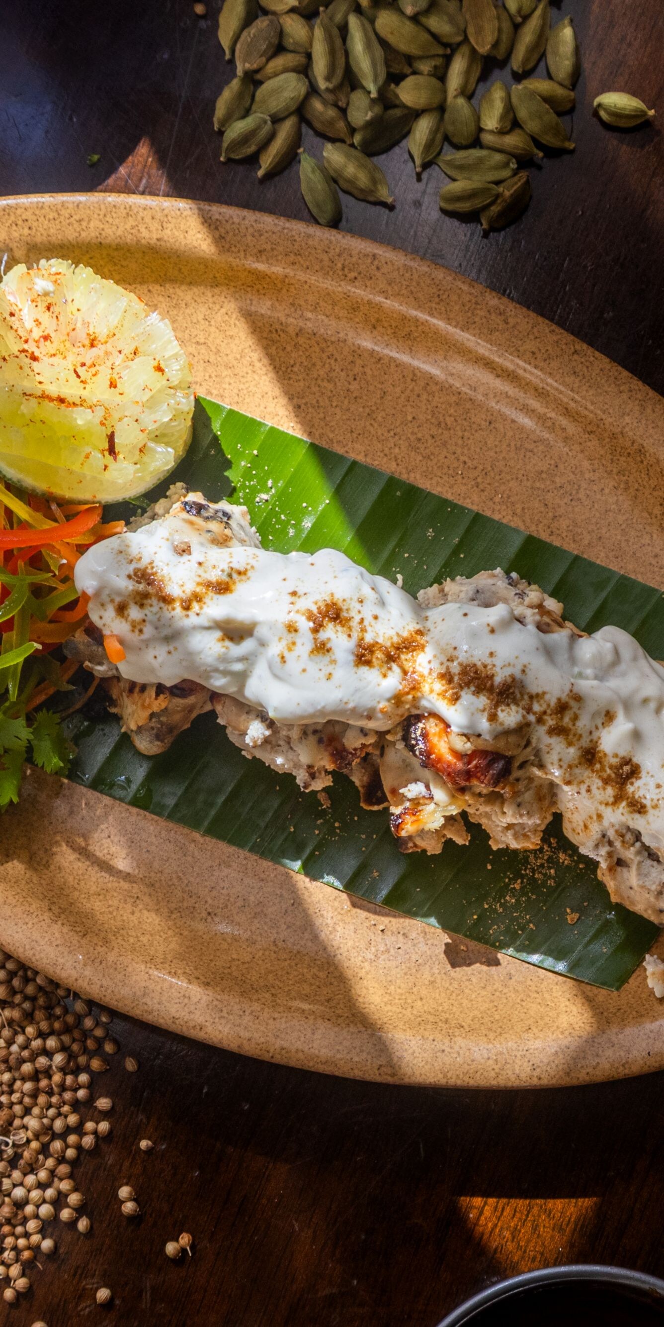 Grilled chicken kebab with yogurt and herbs