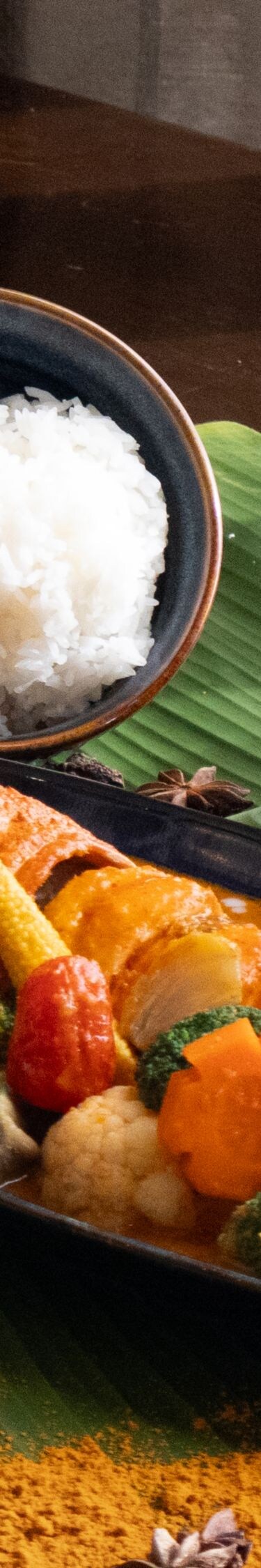 Lobster curry with rice and fresh greens