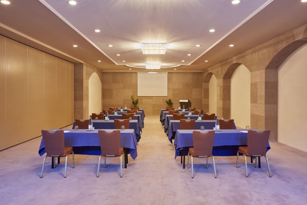 A conference room with schoolroom set up