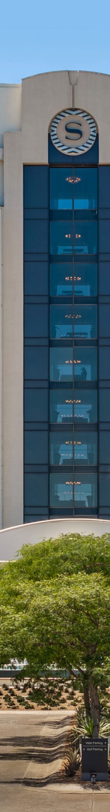 exterior of hotel with marina views
