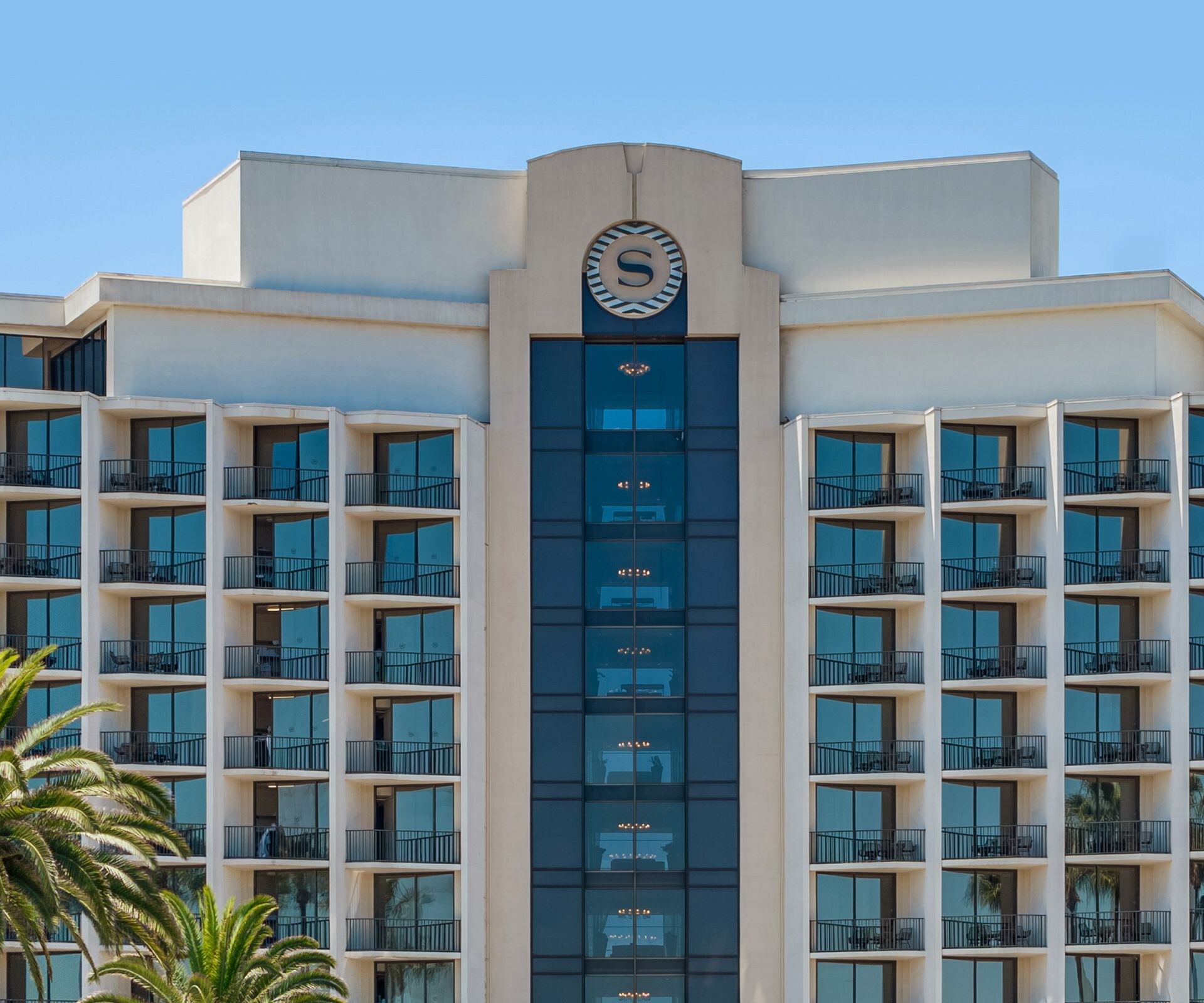 exterior of hotel with marina views