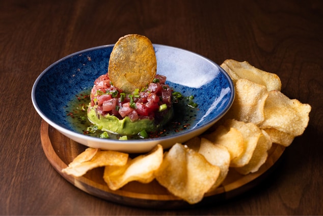 tuna tartar with chips on a plate