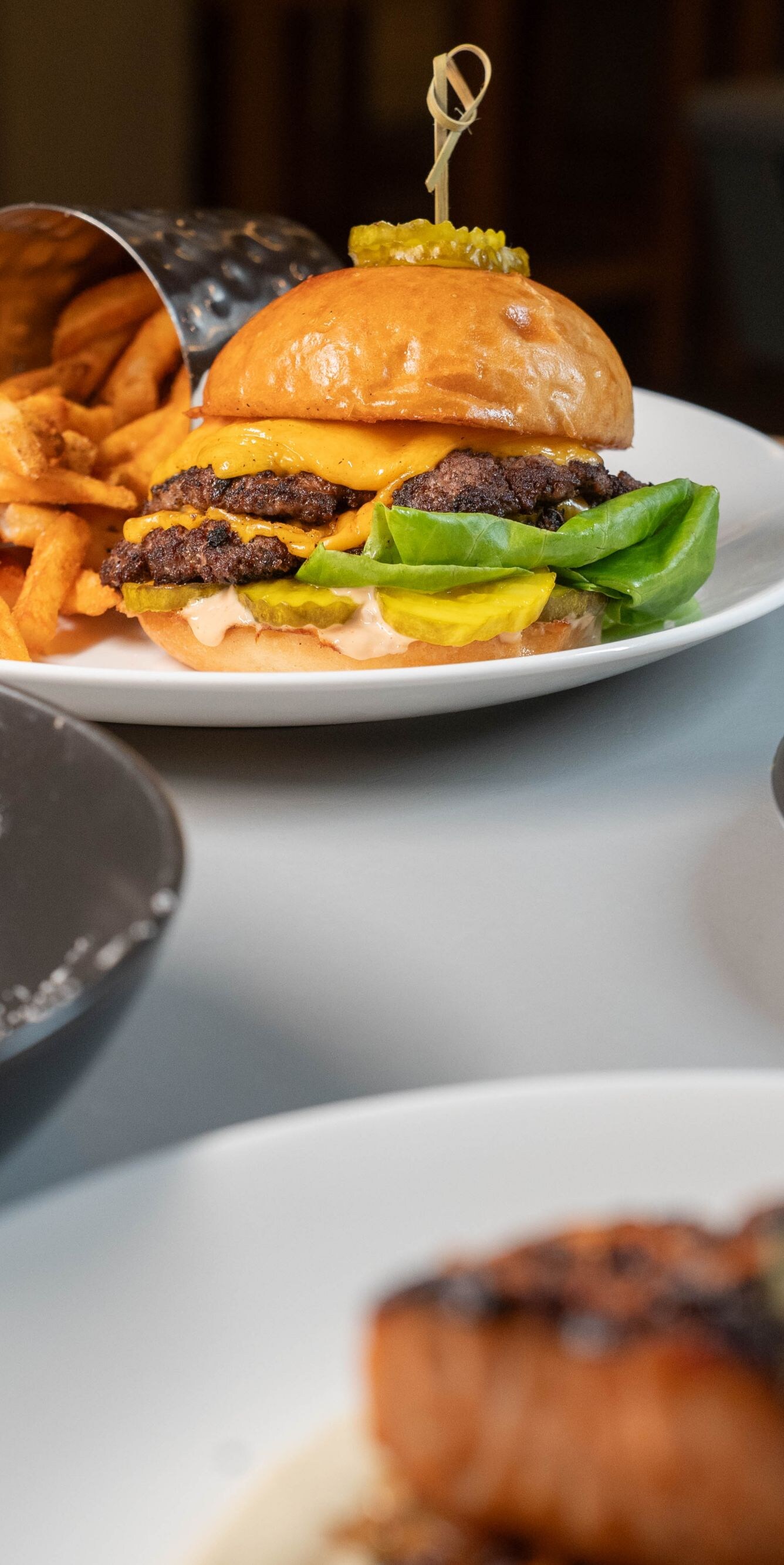 Cheeseburger and desserts at the restaurant