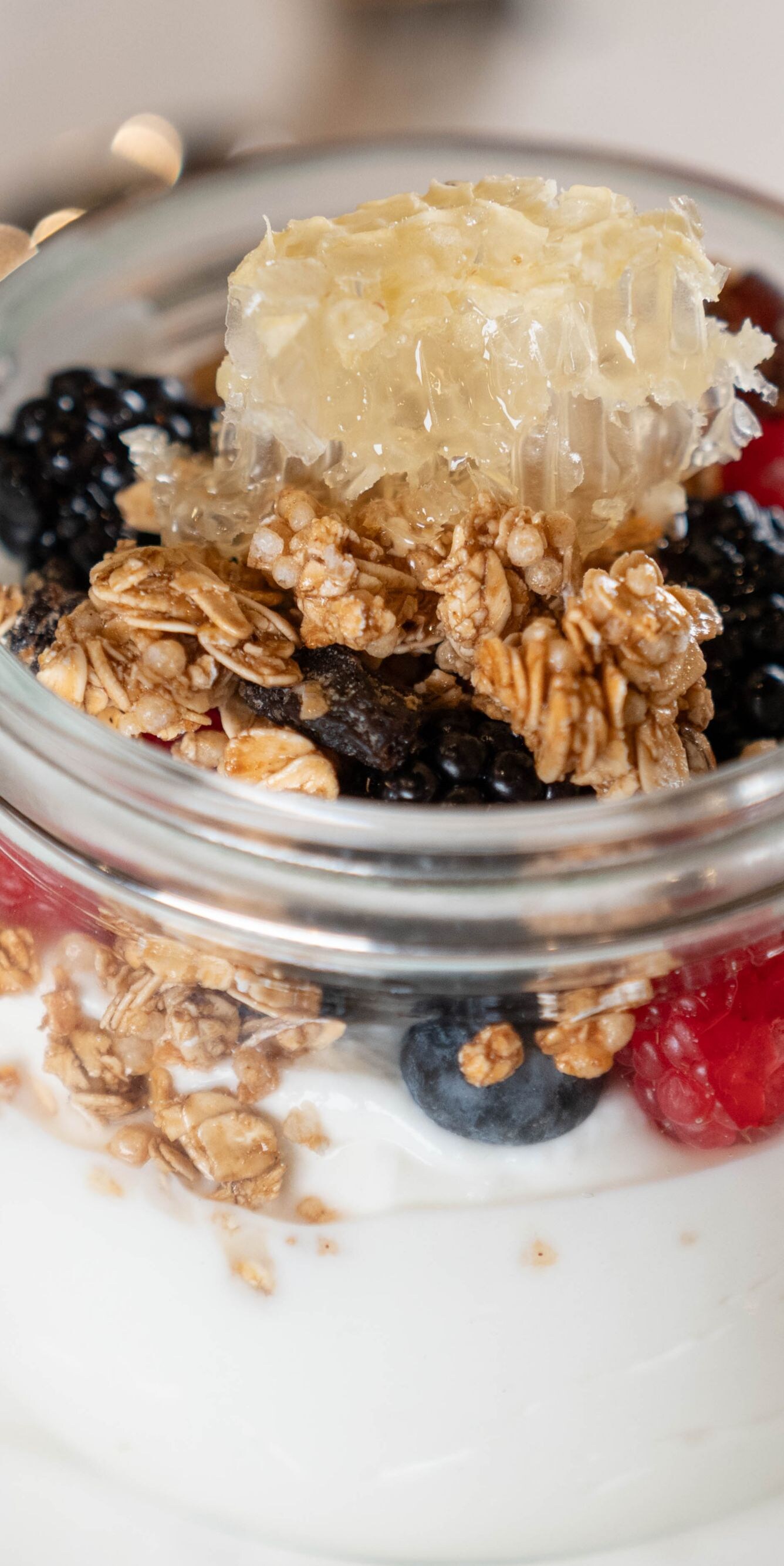Yogurt parfait with berries and honeycomb