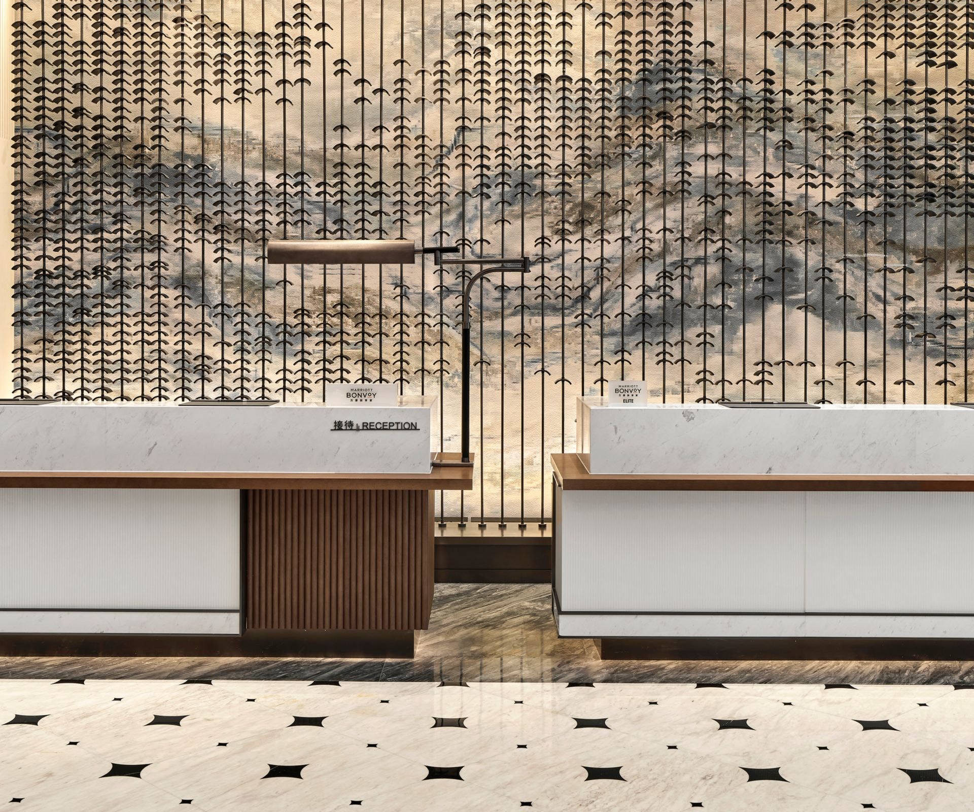 Reception desk with marble and metal art