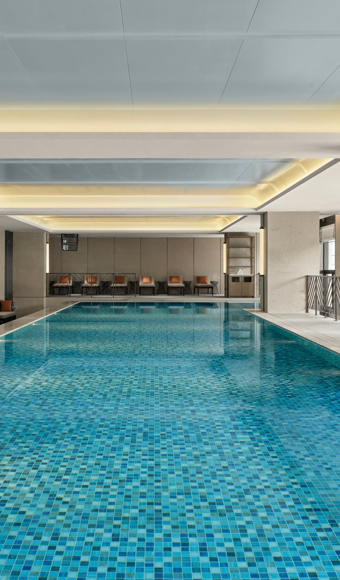 Indoor pool with modern design and lighting