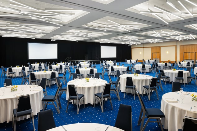 Grand Ballroom with rounds of 6 set up.