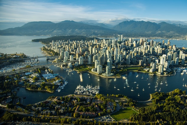 Aerial view of Vancouver's downtown and greenery.