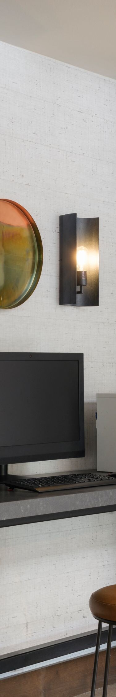 Desk with two computers, printer
