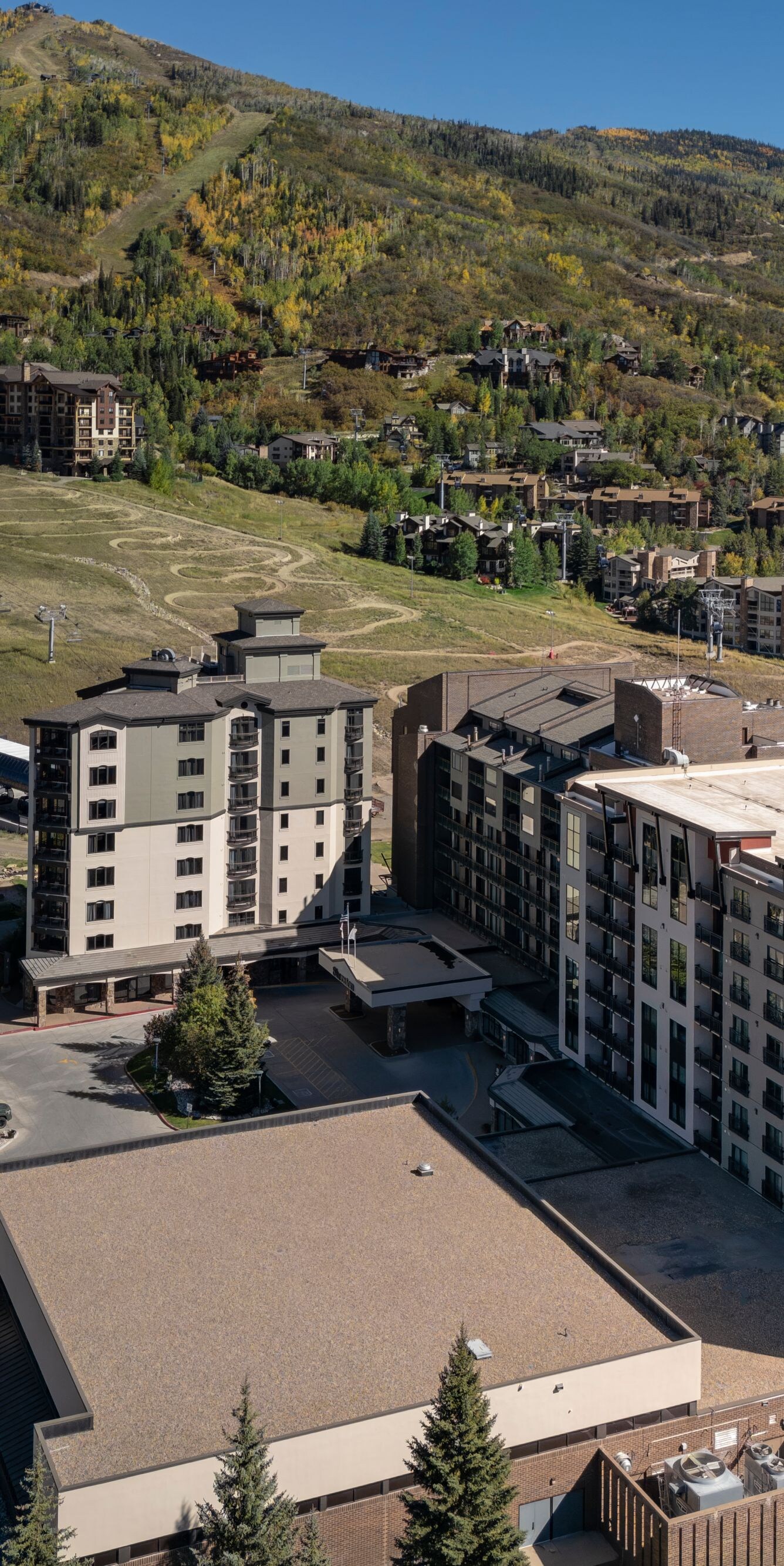 Aerial of exterior, gondola, mountains