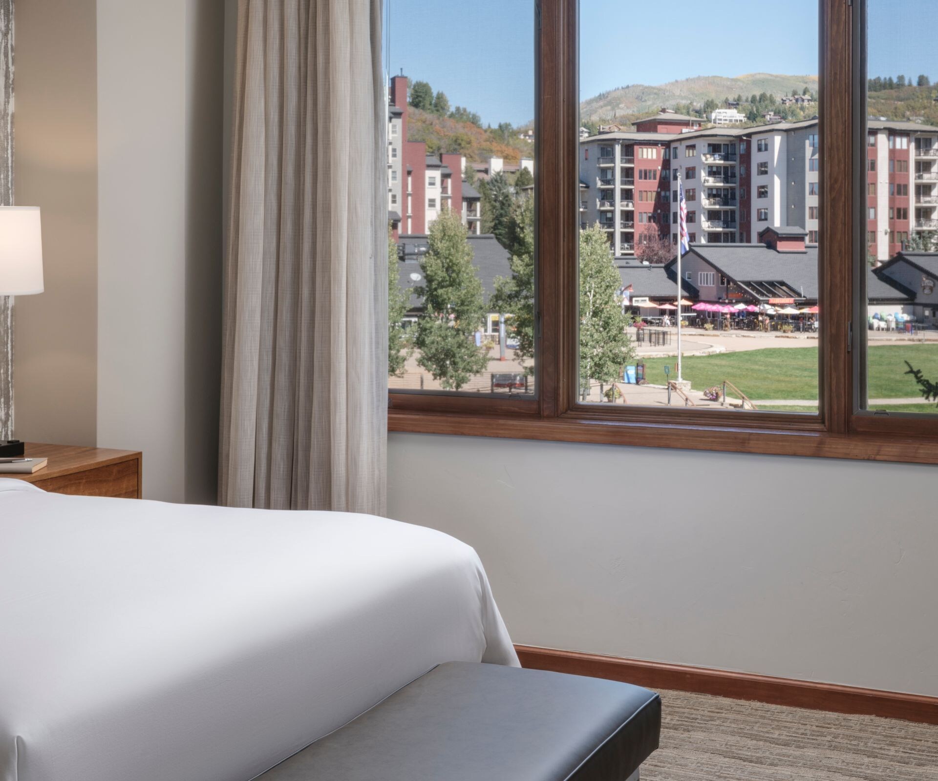 Queen bed, TV, view of resort area
