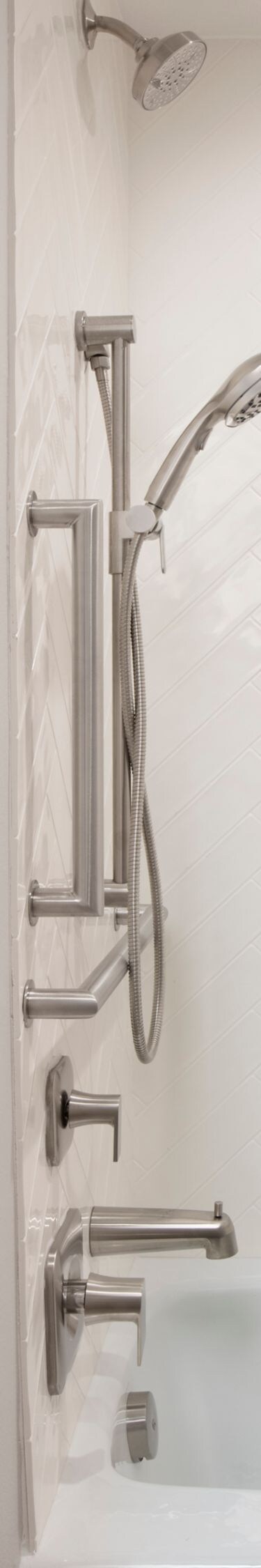 Accessible bathtub with grab bars and shower seat