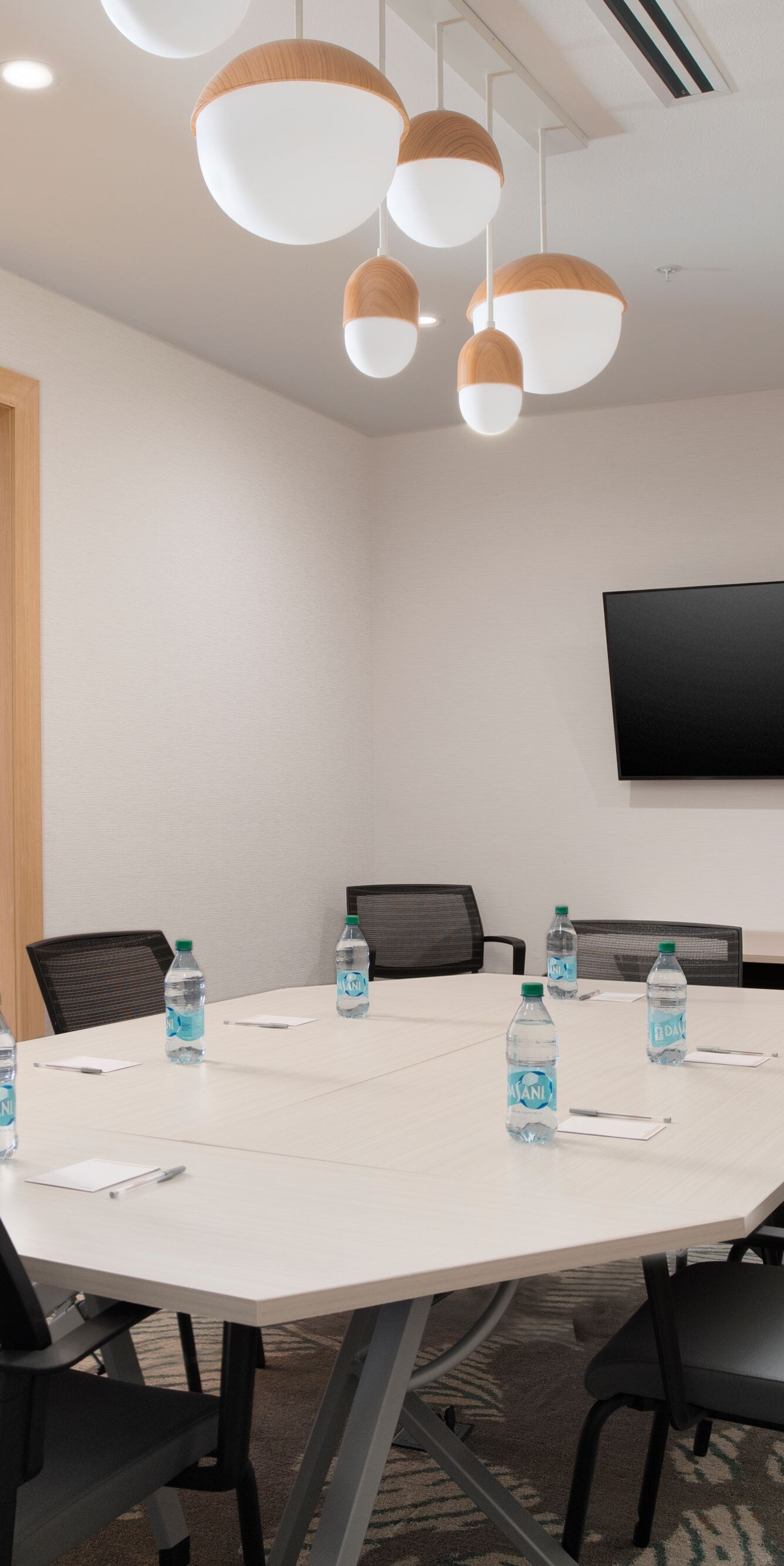 Boardroom seating for ten with television
