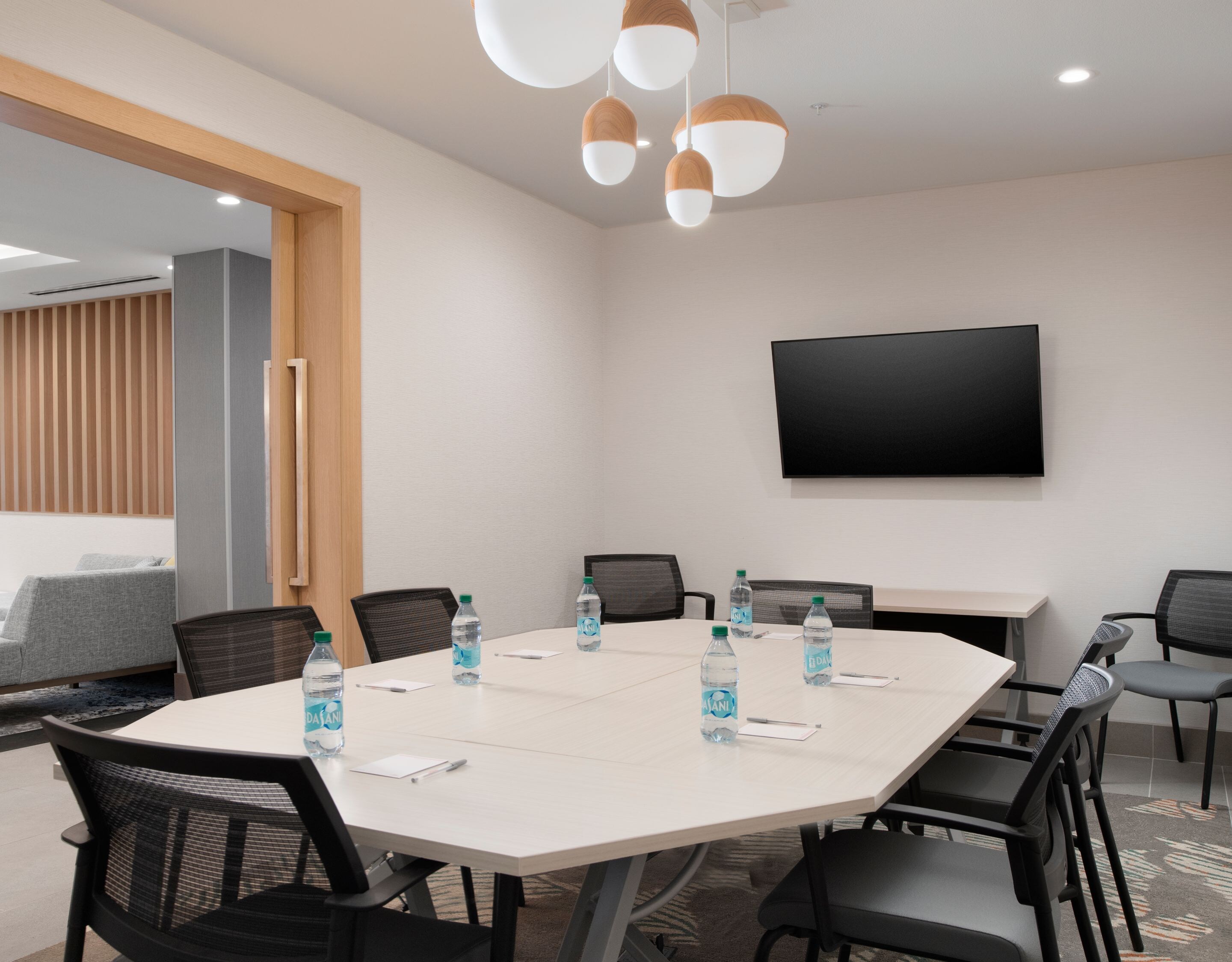 Boardroom seating for ten with television
