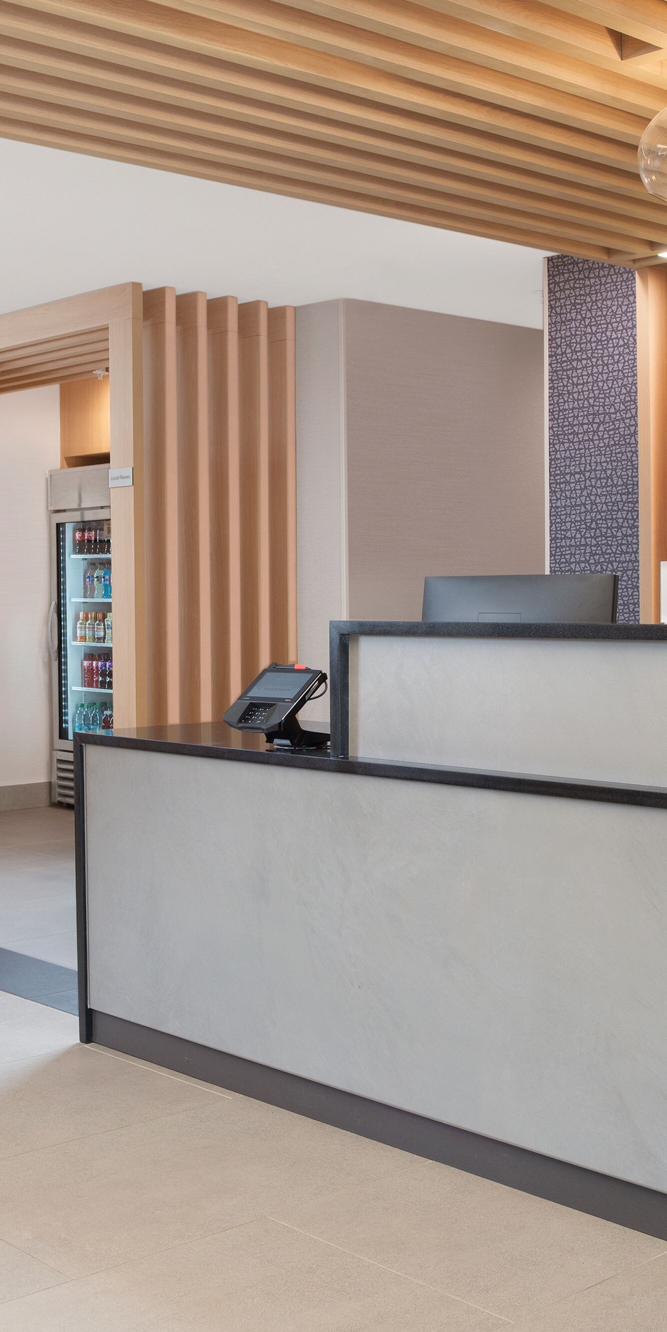 Modern front desk and lobby area