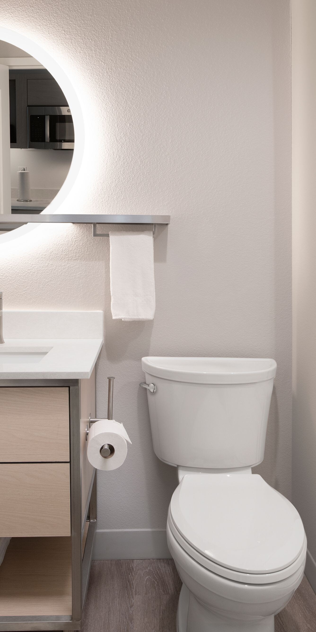 Accessible bathroom with vanity, toilet, and tub