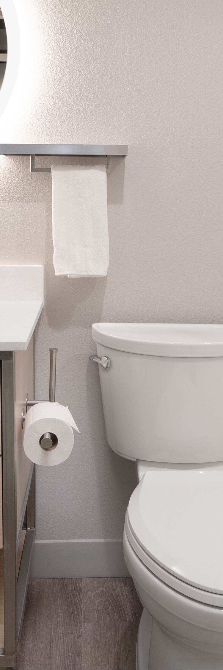 Accessible bathroom with vanity, toilet, and tub