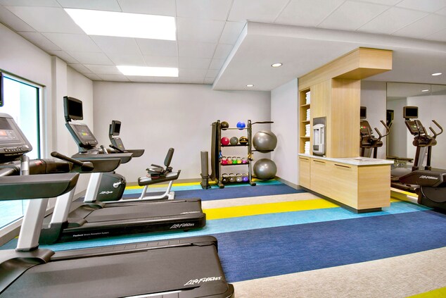 Gym with weights and cardio equipment